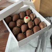 Chocolate-covered strawberries with a white heart